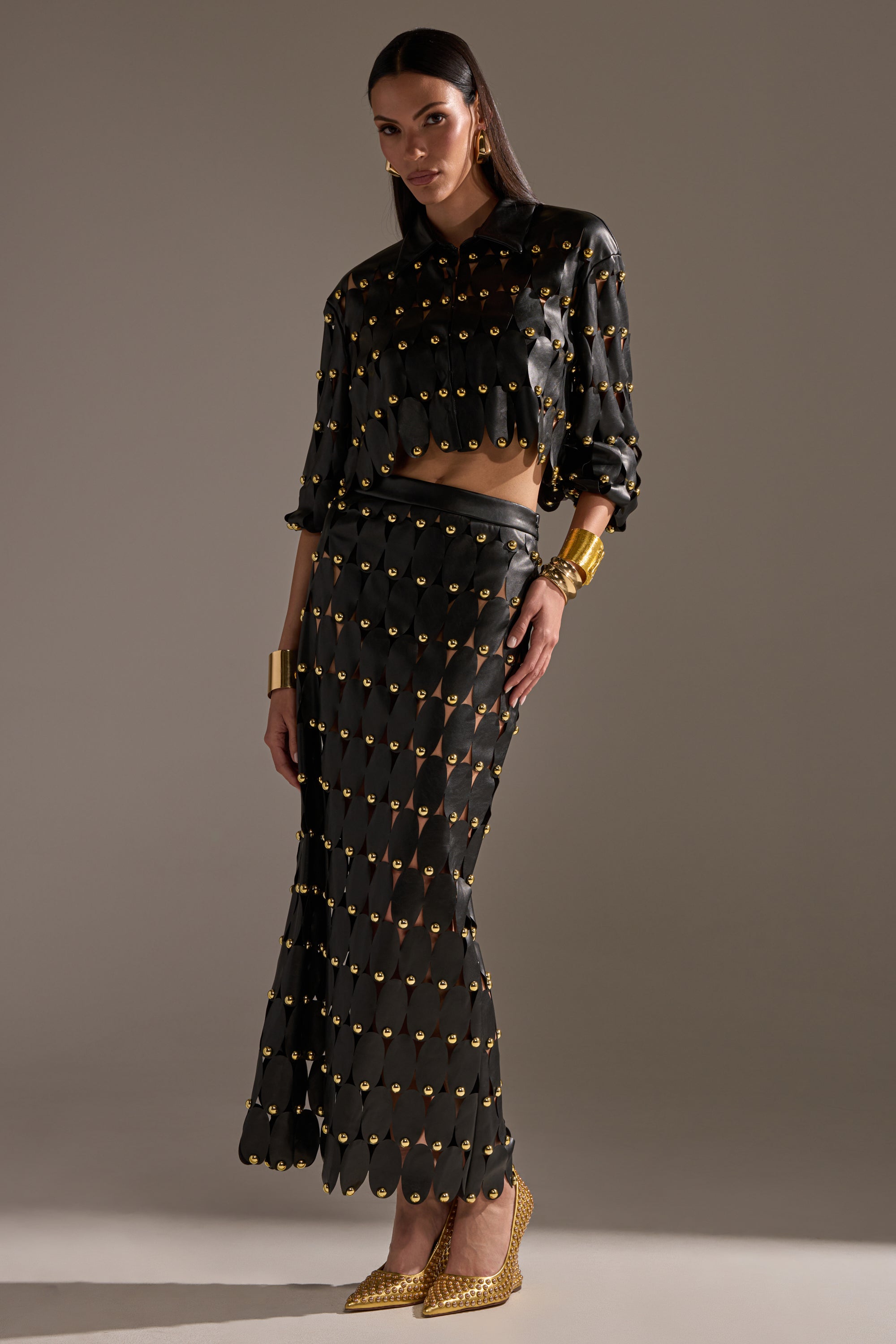 THE SNEAK PEEK STUDDED PU MIDI SKIRT IN BLACK