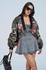 ON THE RUN CAMO SHRUG