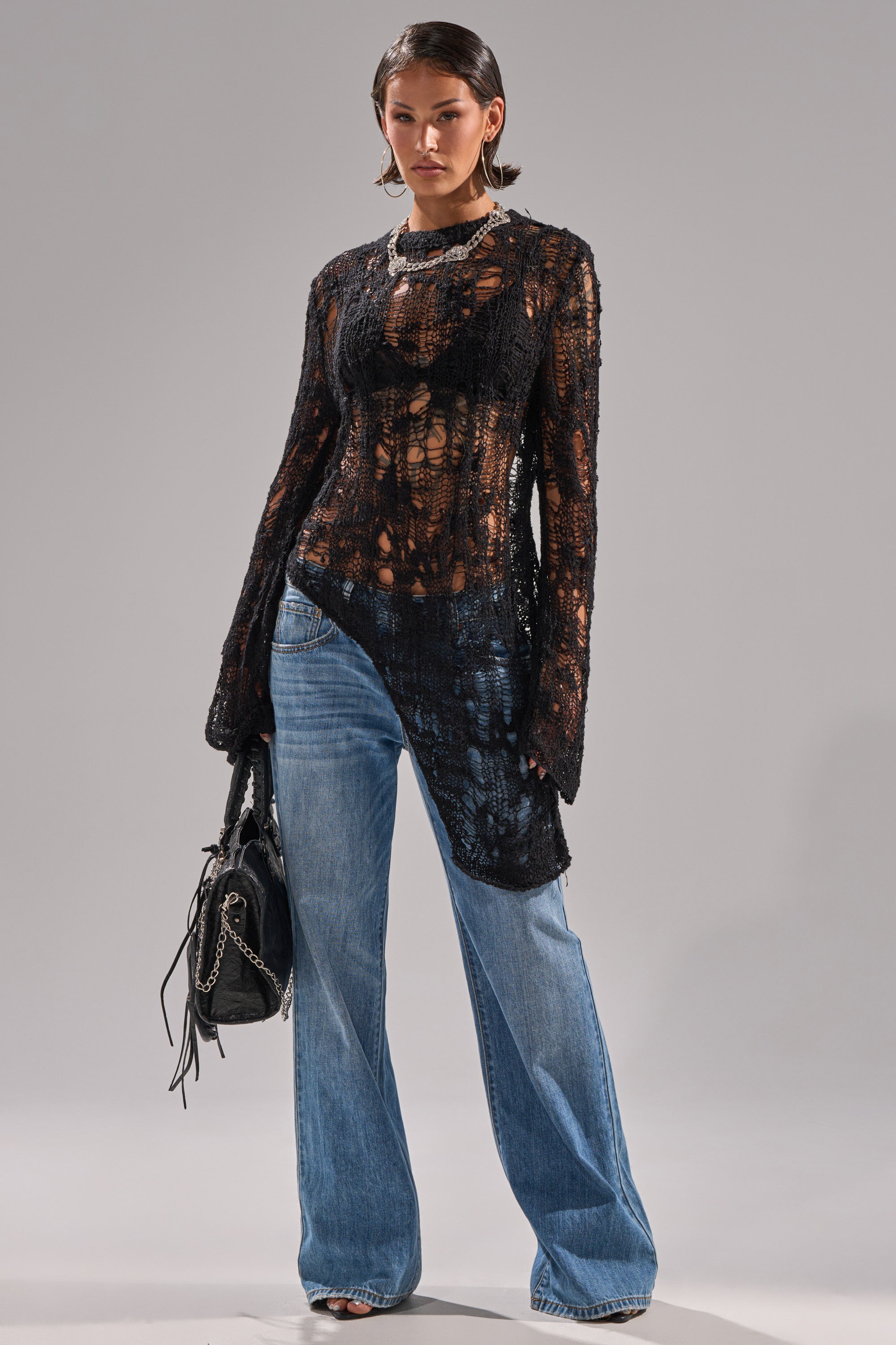 ASYMMETRICAL KNIT SWEATER