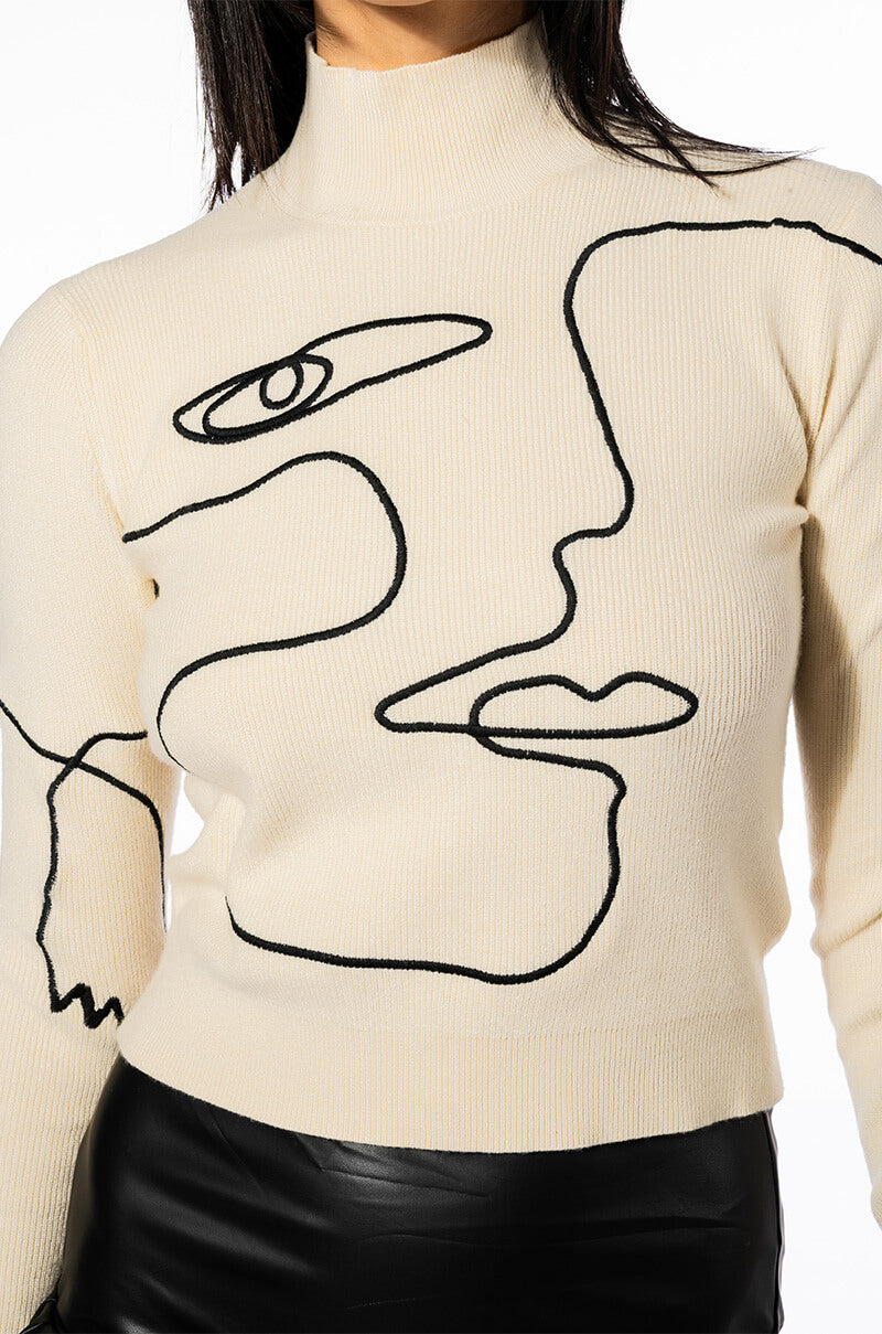 WILLA ABSTRACT FACE RIBBED TURTLENECK SWEATER