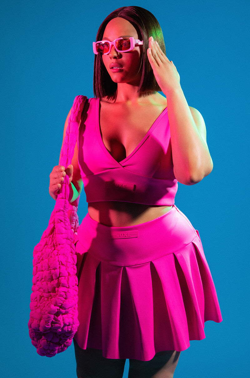 ITS THE PAXTON LUXE PLEATED SKORT IN NEON PINK