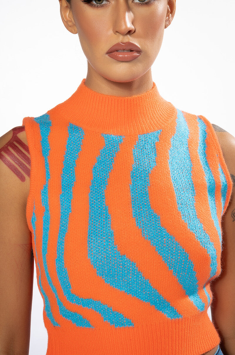 EYE OF THE TIGER SLEEVELESS SWEATER