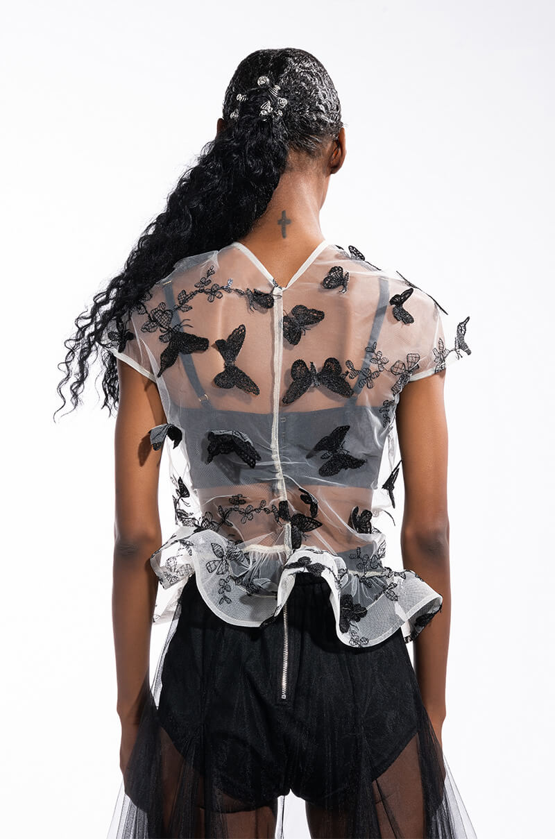 FLUTTERBY SHORT SLEEVE PEPLUM BLOUSE