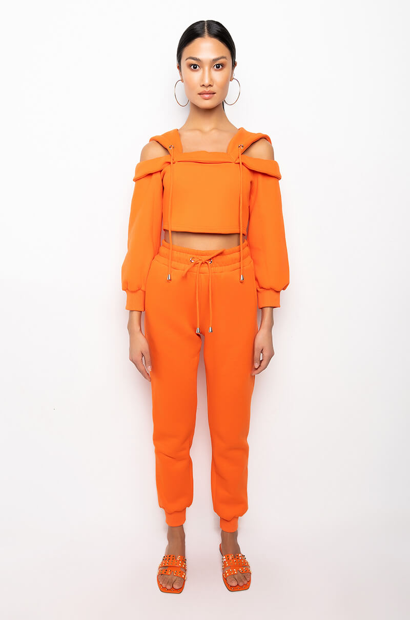 GUILTY BY ASSOCIATION CROPPED OFF THE SHOULDER SWEATSHIRT