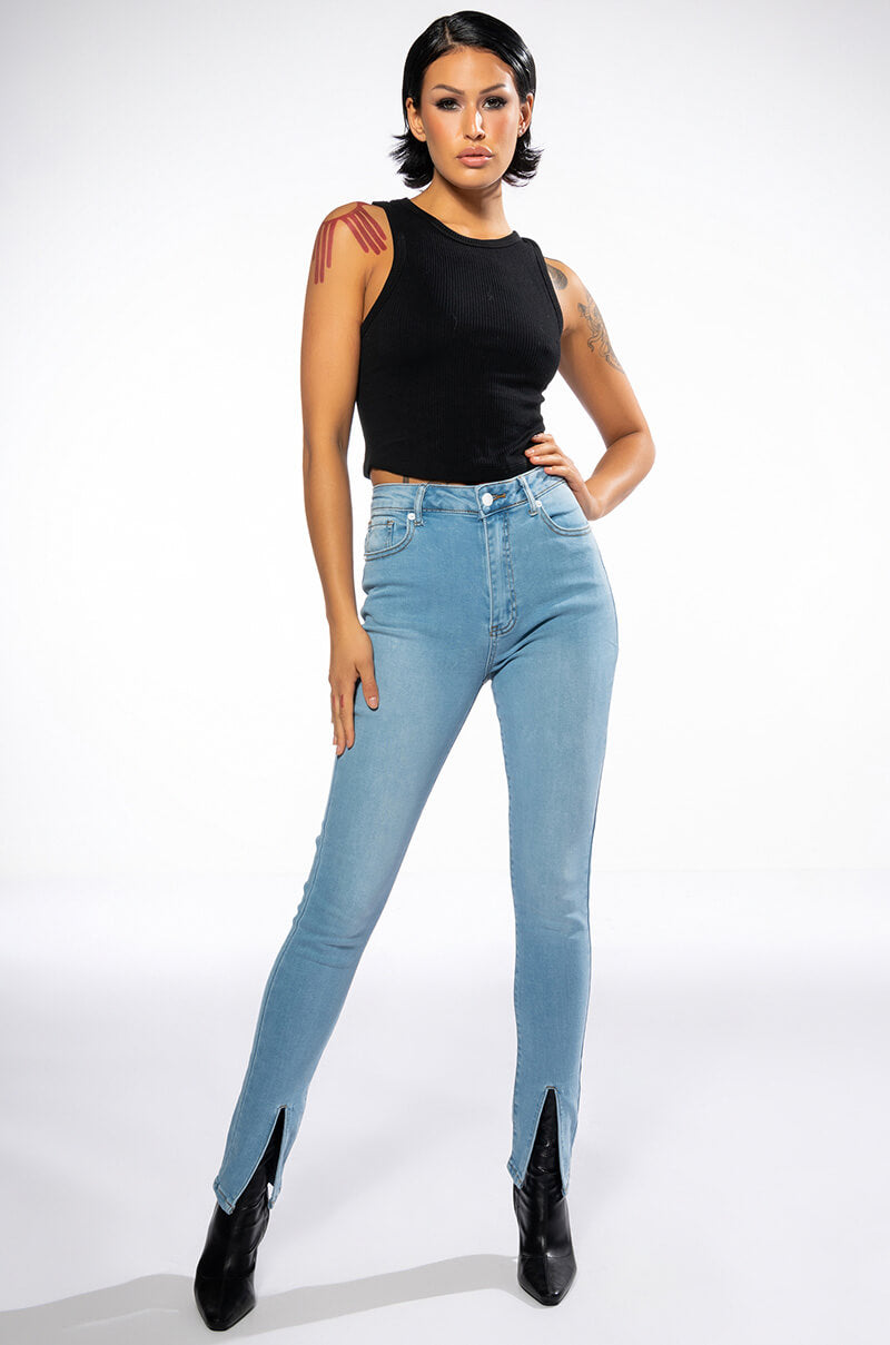 NIGHTFALL MID RISE SKINNY JEANS WITH FRONT SLIT