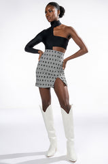 READ BETWEEN THE LINES HIGH RISE MINI SKIRT