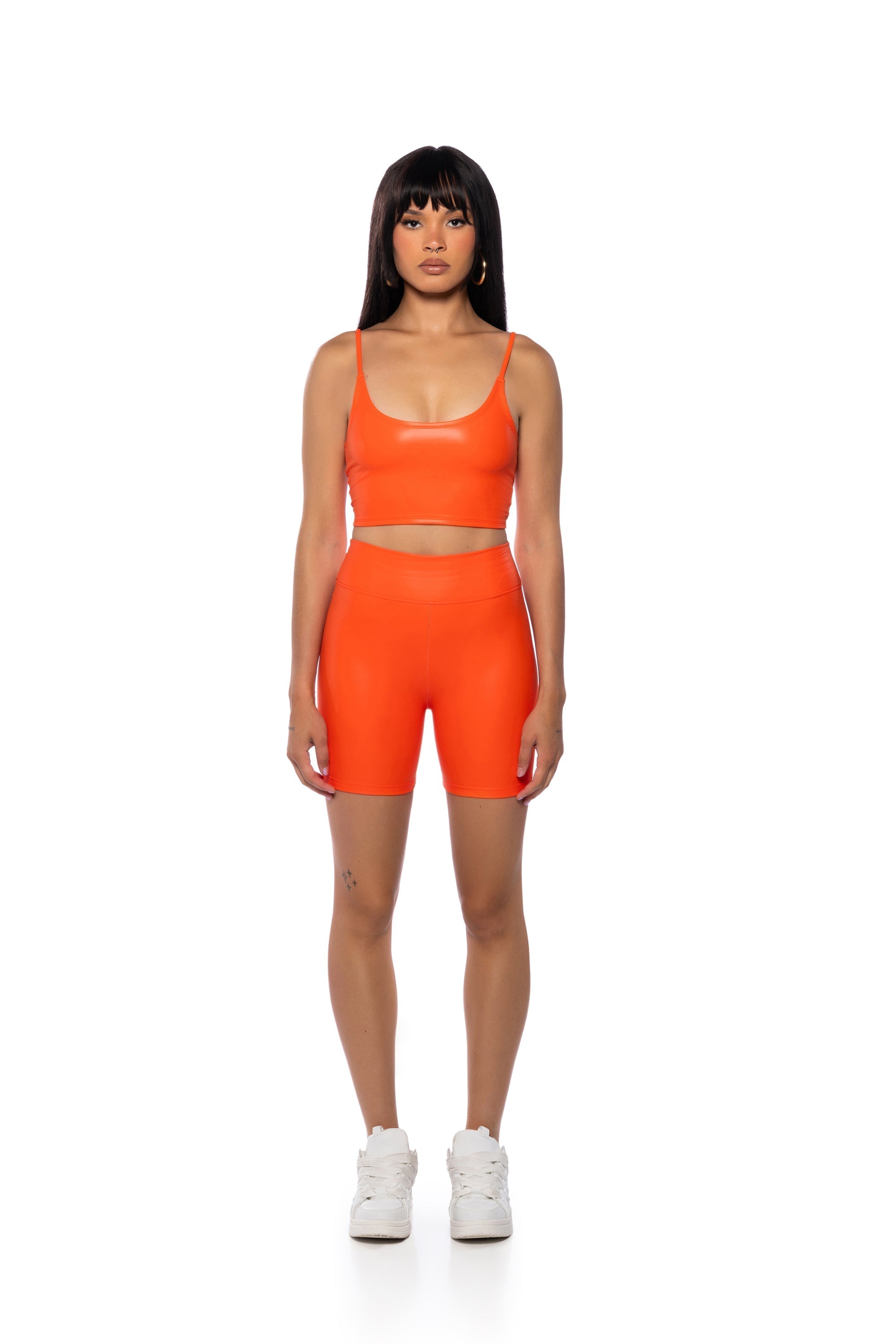 RIO FAUX LEATHER BIKER SHORT IN ORANGE