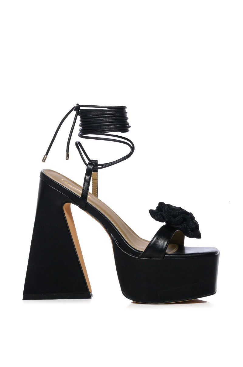 SOMETHING SWEET CHUNKY PLATFORM LACE UP SANDAL WITH FLOWER DETAIL IN BLACK