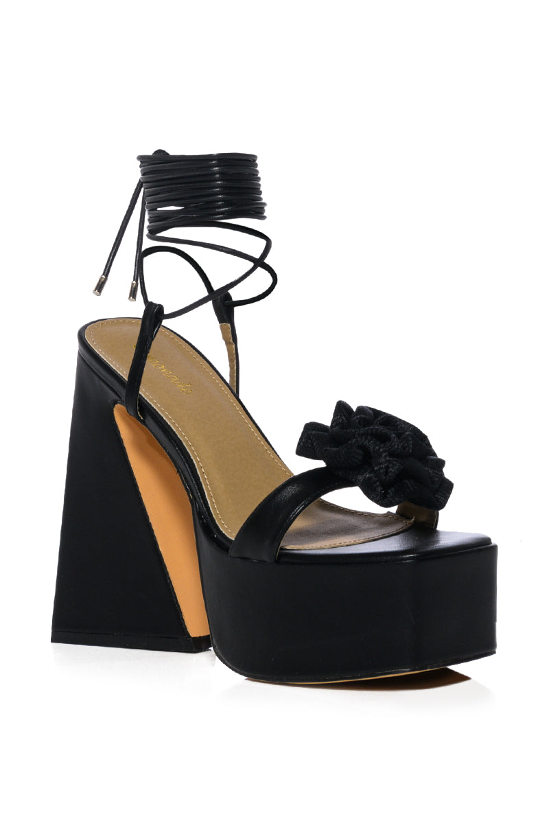 SOMETHING SWEET CHUNKY PLATFORM LACE UP SANDAL WITH FLOWER DETAIL IN BLACK