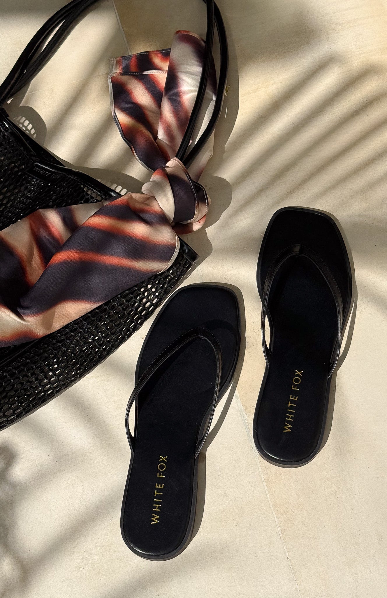 Breccan Thong Sandals Black