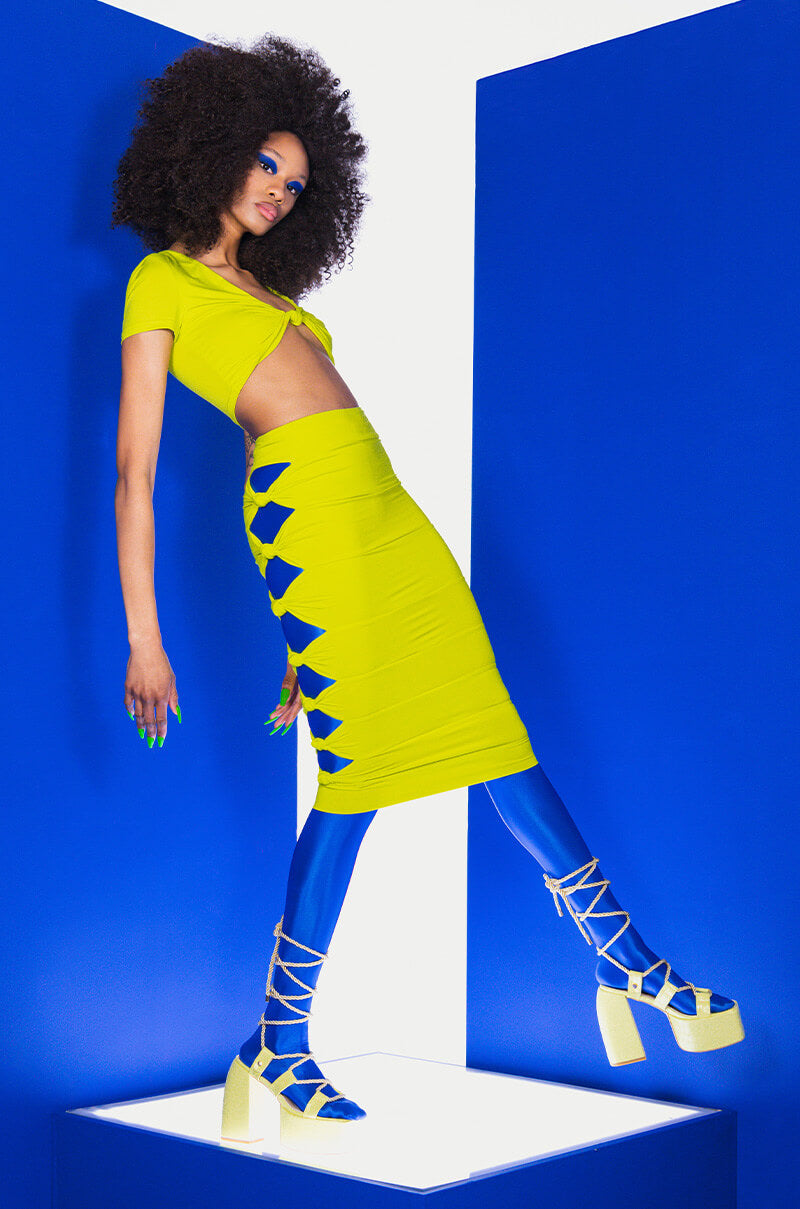 WORST BEHAVIOR CUTOUT MIDI SKIRT